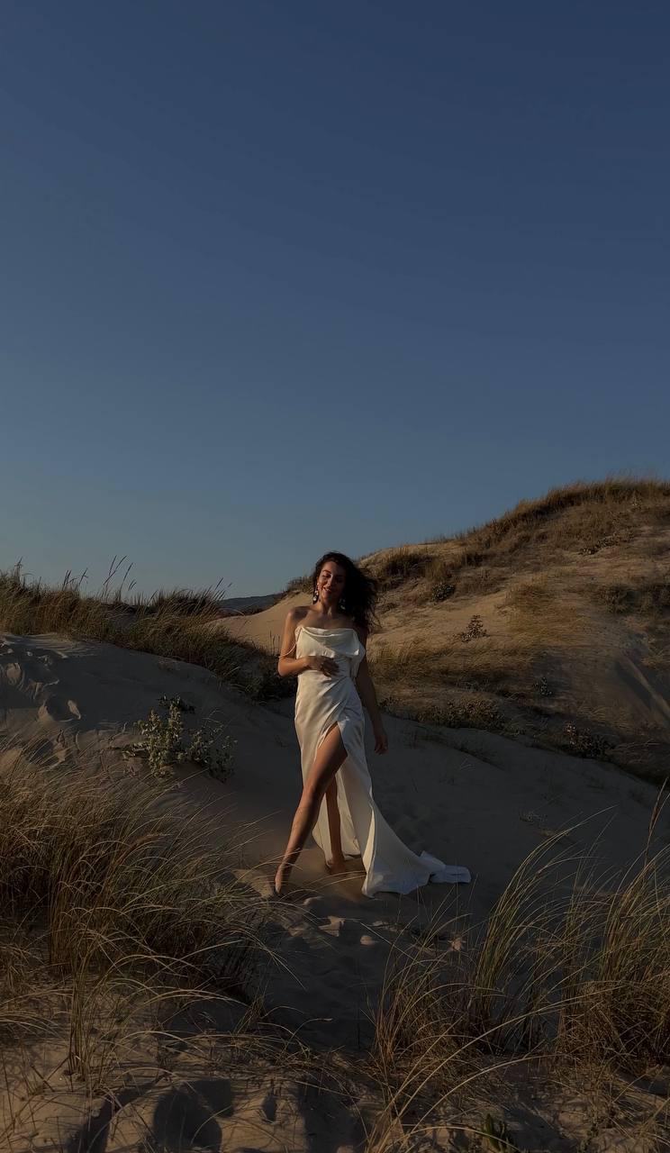 Solaria | Off‑Shoulder Silk Satin Wedding Dress with Open Back, Tailored Fit & Flowing Train, Minimalist Custom Gown